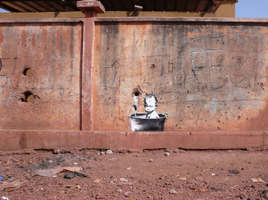 http://www.banksy.co.uk/outdoors/images/tableimages/babybath.jpg
